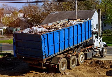 Recycling container trash dumpsters being full with garbage
