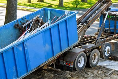 Construction trash ioading the garbage dumpsters can waste construction trash dumpsters on house renovation.